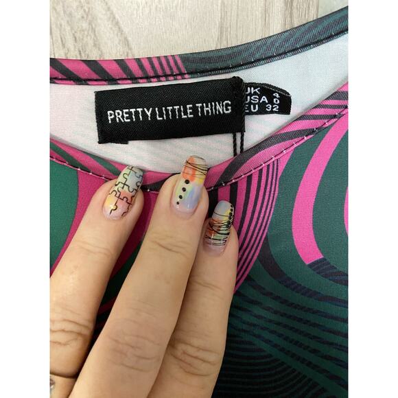 NWT Pretty little things pink print slinky cross front bodysuit size 0 - Picture 5 of 9